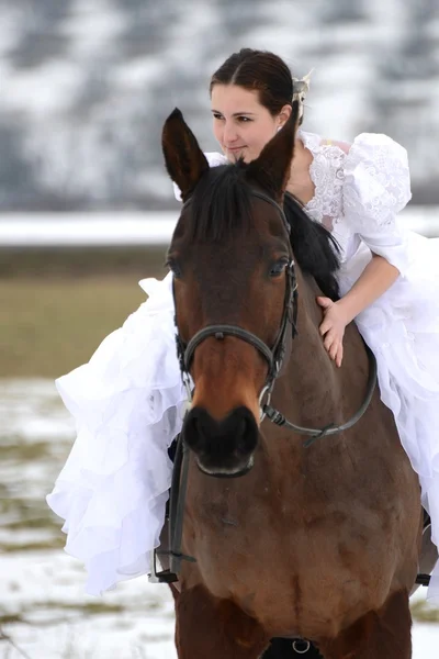 Portrait of a beautiful bride and horse — Stock Photo, Image