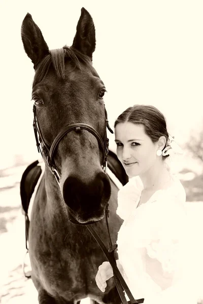 Portrait of a beautiful bride and horse — Stock Photo, Image