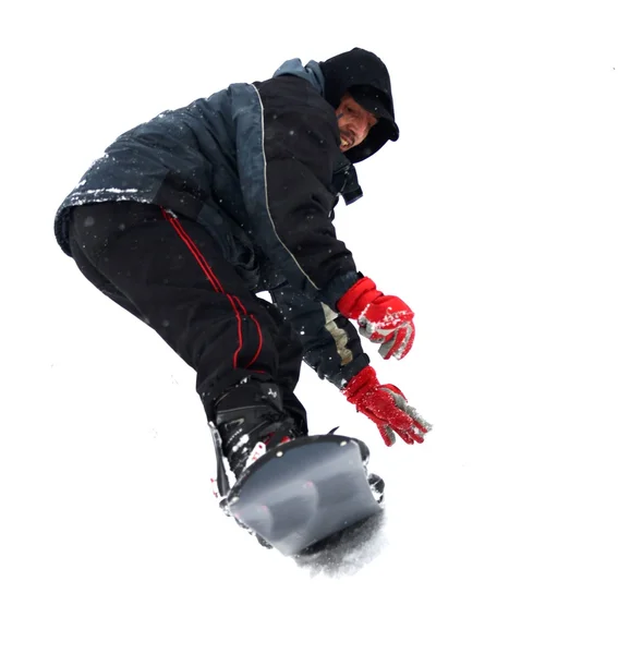 Jovem tentando andar de snowboard — Fotografia de Stock