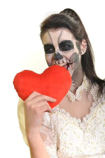 Jonge vrouw in de dag van het dode masker schedel gezicht kunst — Stockfoto