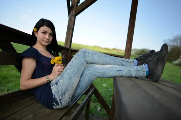 Beautiful woman with dandelion — Stock Photo, Image