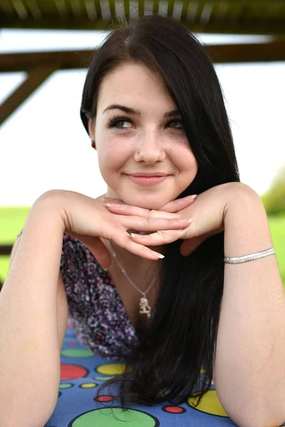 Beautiful young woman in the field — Stock Photo, Image