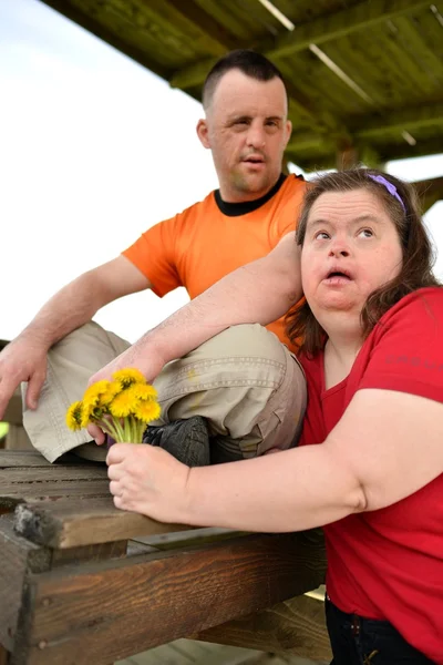 Down syndrome love couple — Stock Photo, Image