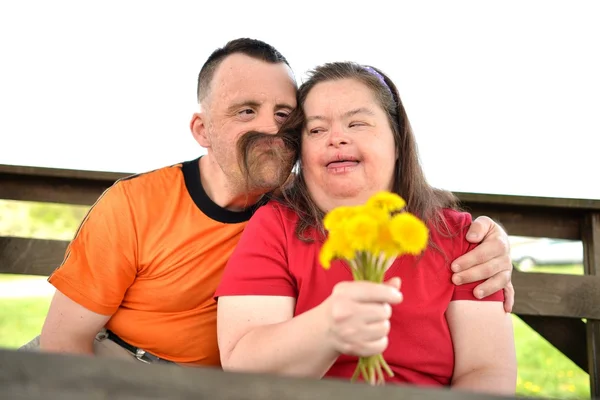 Down syndrome love couple — Stock Photo, Image