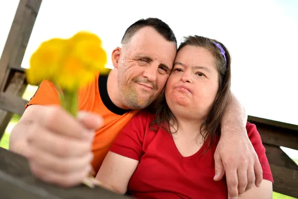 Down syndrome love couple — Stock Photo, Image
