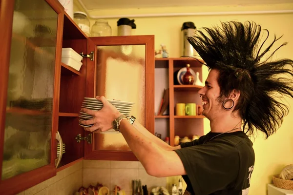 Young punk cooking — Stock Photo, Image