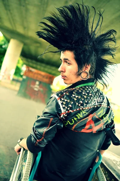 Punk boy in a wheelchair — Stock Photo, Image