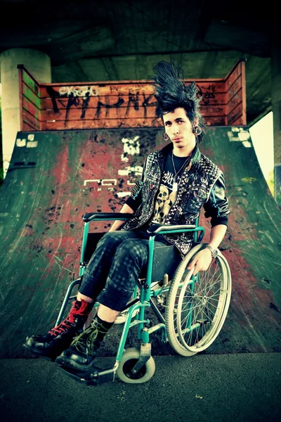 Punk boy in a wheelchair — Stock Photo, Image