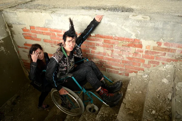 Punk boy in a wheelchair — Stock Photo, Image