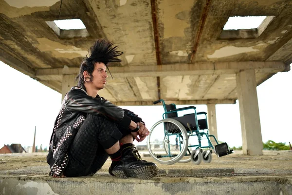 Punk boy and wheelchair — Stock Photo, Image