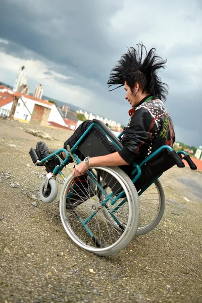 Punk boy in a wheelchair — Stock Photo, Image