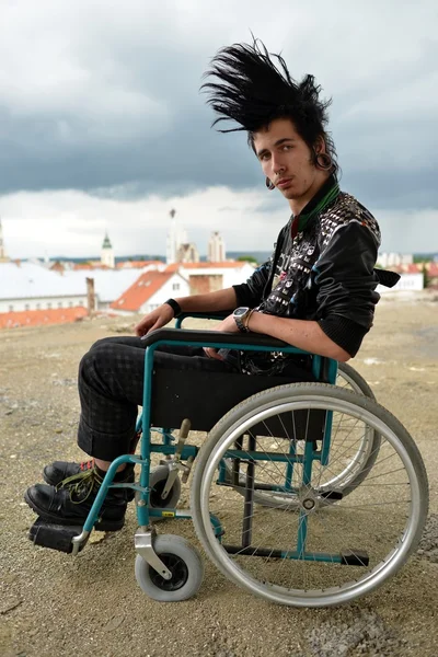 Punk boy in a wheelchair — Stock Photo, Image