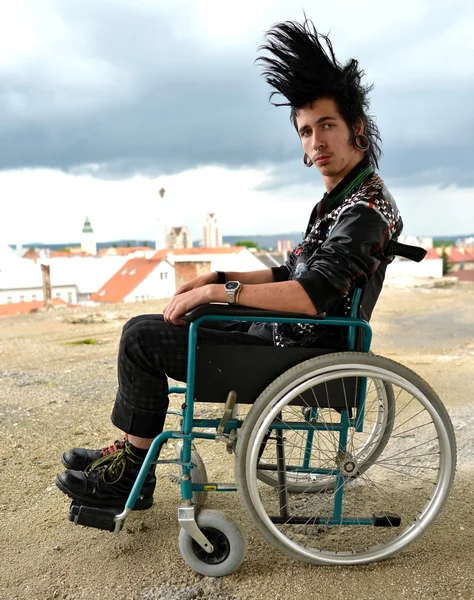 Punk boy in a wheelchair — Stock Photo, Image