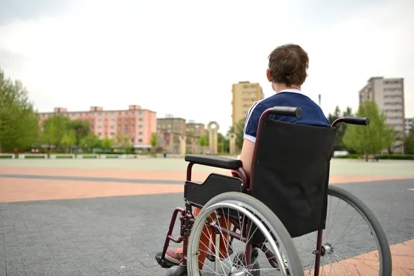 Invalid man on the wheelchair — Stock Photo, Image