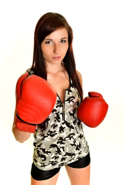 Mujer joven con guante de boxeo —  Fotos de Stock