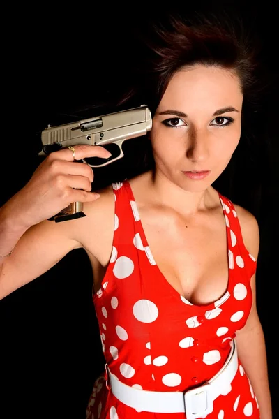 Woman with gun — 图库照片