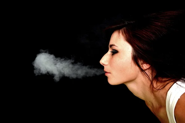 Woman smoking e-cigarette — Stock Photo, Image