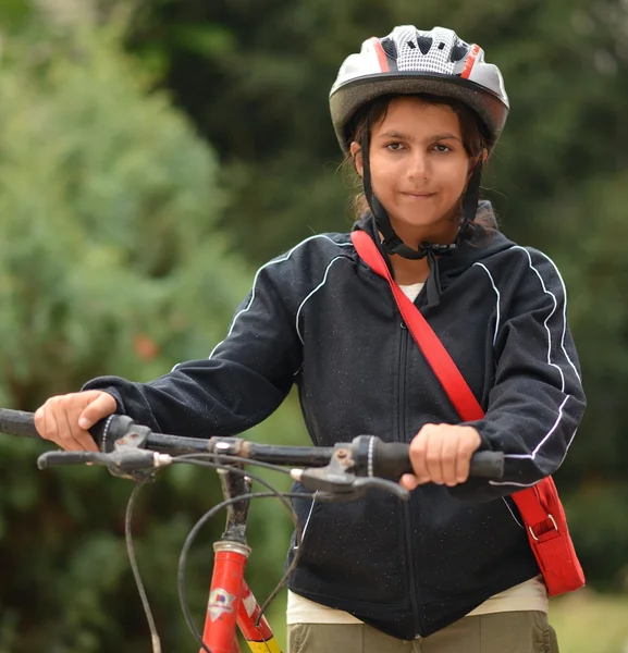 Woman with bicycle — Stock Photo, Image