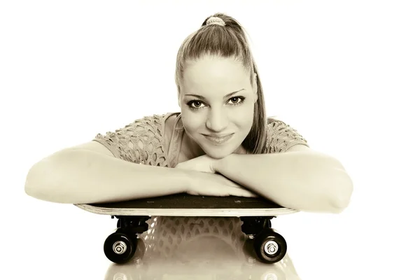 Portrait of beautiful extreme girl with skateboard — Stock Photo, Image