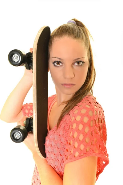 Menina com skate — Fotografia de Stock