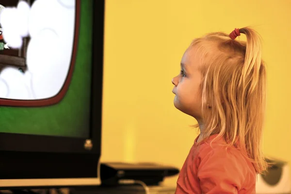Baby girl watching cartoons — Stock Photo, Image