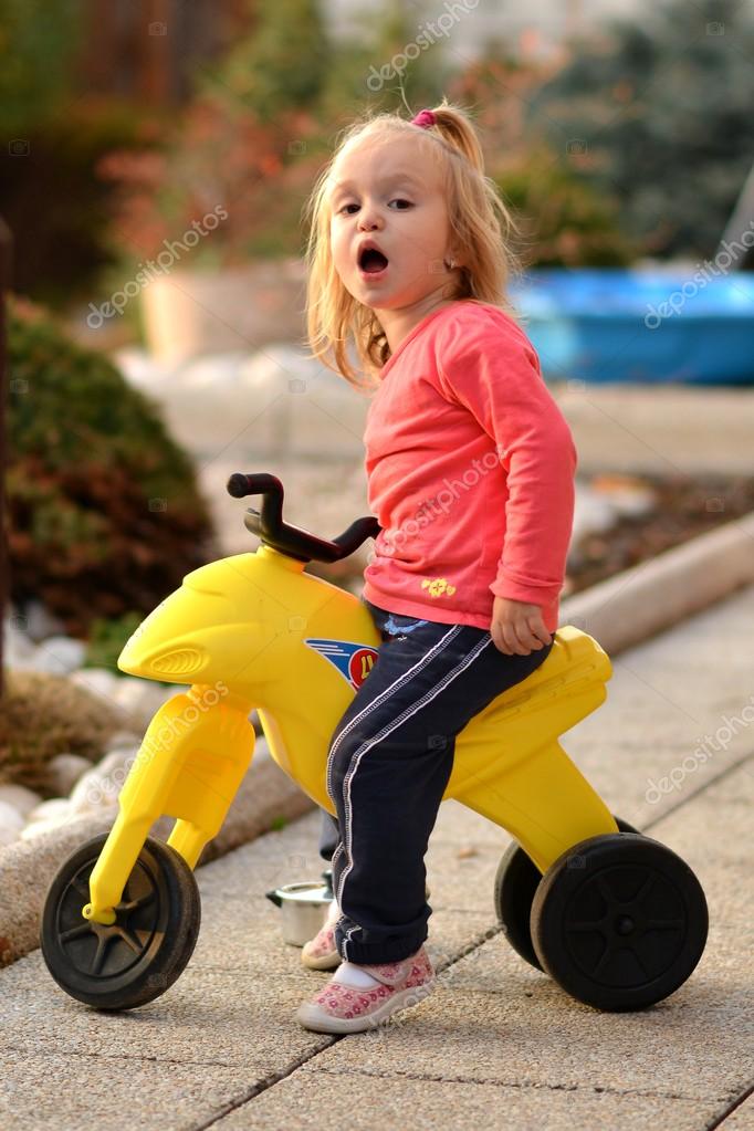 baby riding bicycle