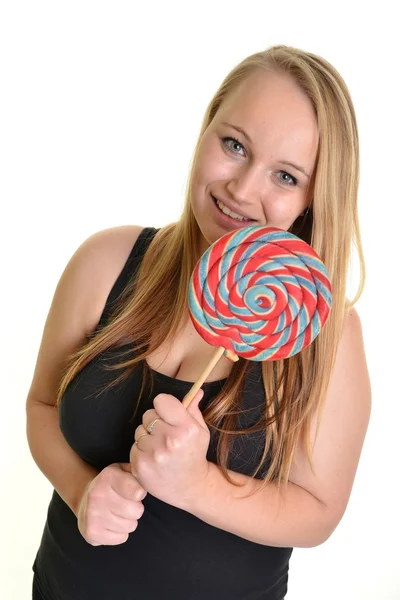 Chica sosteniendo lollipop colorido —  Fotos de Stock