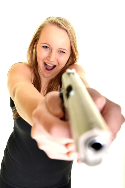 Νεαρή όμορφη γυναίκα, κρατώντας ένα όπλο — Φωτογραφία Αρχείου
