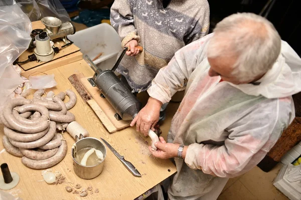 Man grinding meat