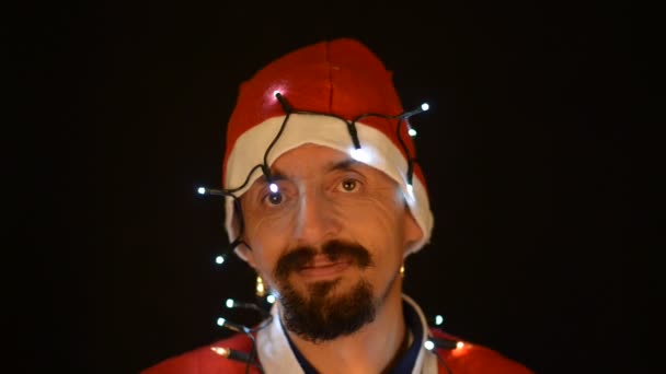Noel ışıkları büyüleyici elinde tutan — Stok video