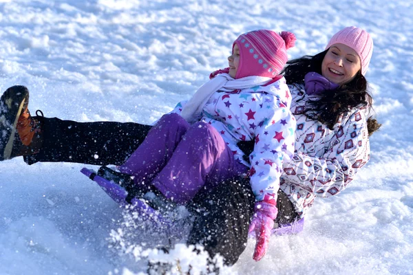 Sledding, winter fun, snow, family sledding — Stock Photo, Image