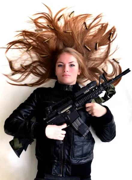 Woman with a gun — Stock Photo, Image