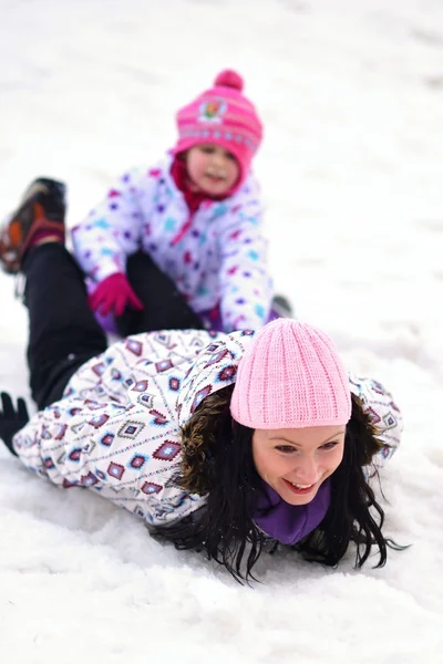 Sledding, winter fun, snow, family sledding — Stock Photo, Image