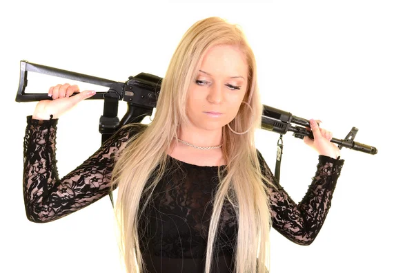 Сексуальная женщина с пистолетом — стоковое фото