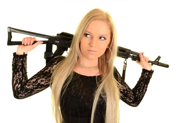 Сексуальная женщина с пистолетом — стоковое фото