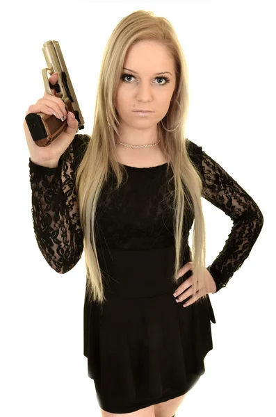 Beautiful young woman with gun — Stock Photo, Image