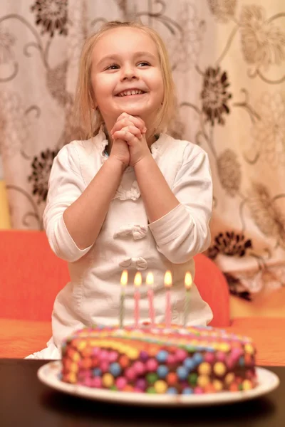 Cute little girl and birthday cake — Stock Photo, Image