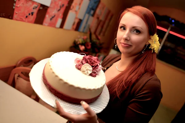 Woman holding a birthday cake. — Stock Photo, Image