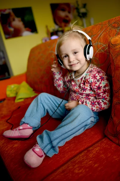 Girl and headphones — Stock Photo, Image