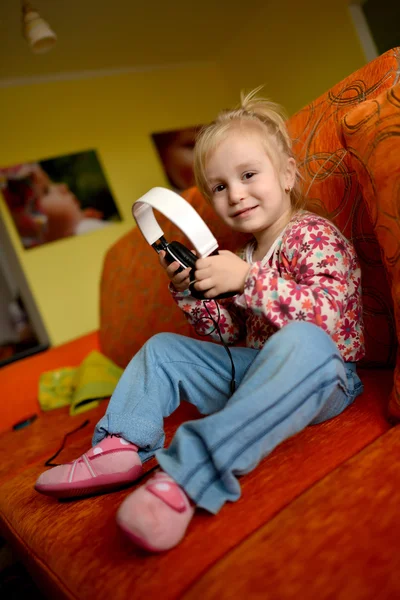 Girl and headphones — Stock Photo, Image