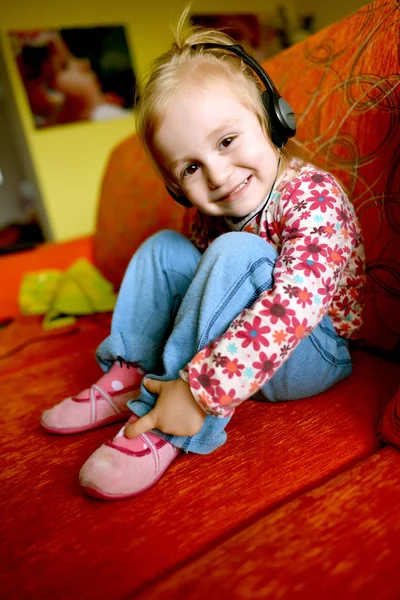 Girl and headphones — Stock Photo, Image