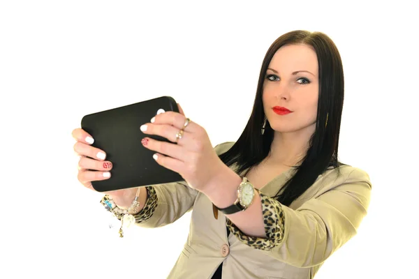 Brunette teen using a tablet pc — Stock Photo, Image