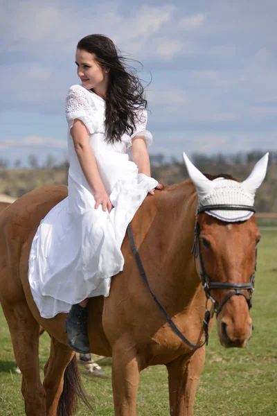Bride on horseback — Stock Photo, Image