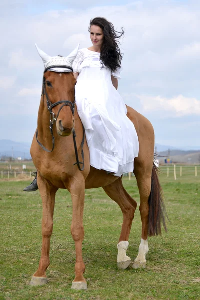 Bride on horseback — Stock Photo, Image