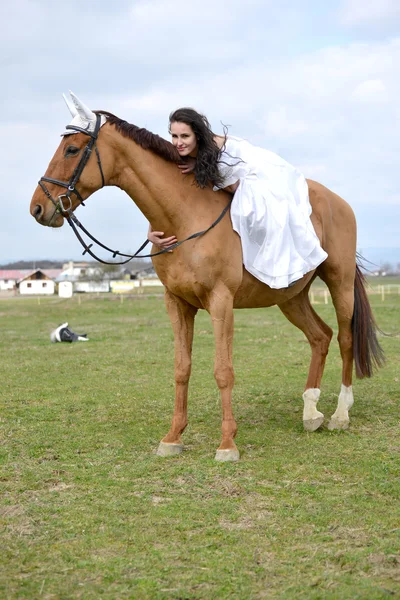 Bride on horseback — Stock Photo, Image