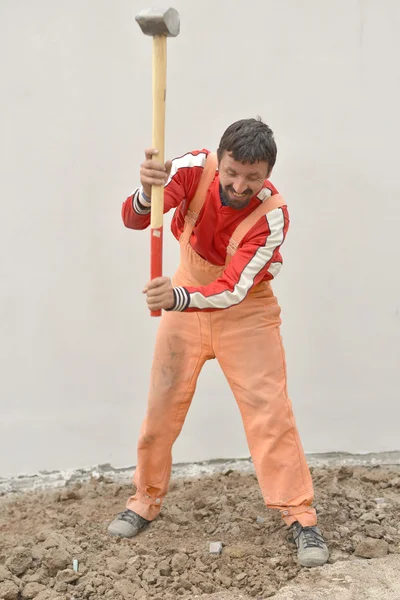 Man and sledge-hammer — Stock Photo, Image