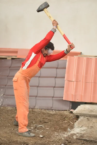 Man and sledge-hammer — Stock Photo, Image