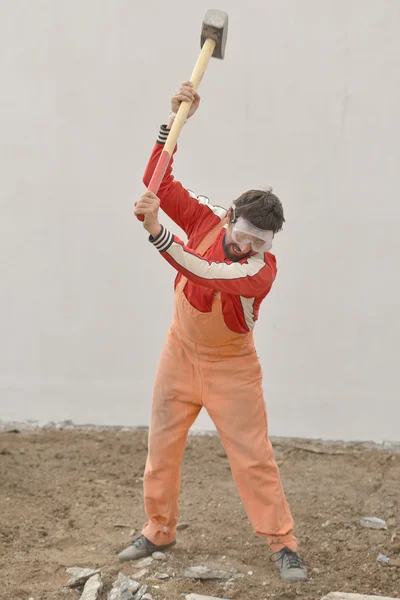 Man and sledge-hammer — Stock Photo, Image