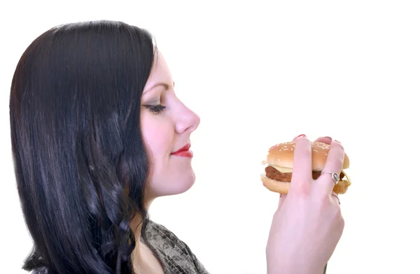 Vrouw bedrijf Hamburger — Stockfoto