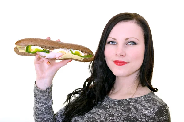 Mujer sosteniendo sándwich — Foto de Stock